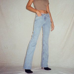 MOTEL ROCKS FRAYED LOW RISE JEANS IN LIGHT WASH BLUE